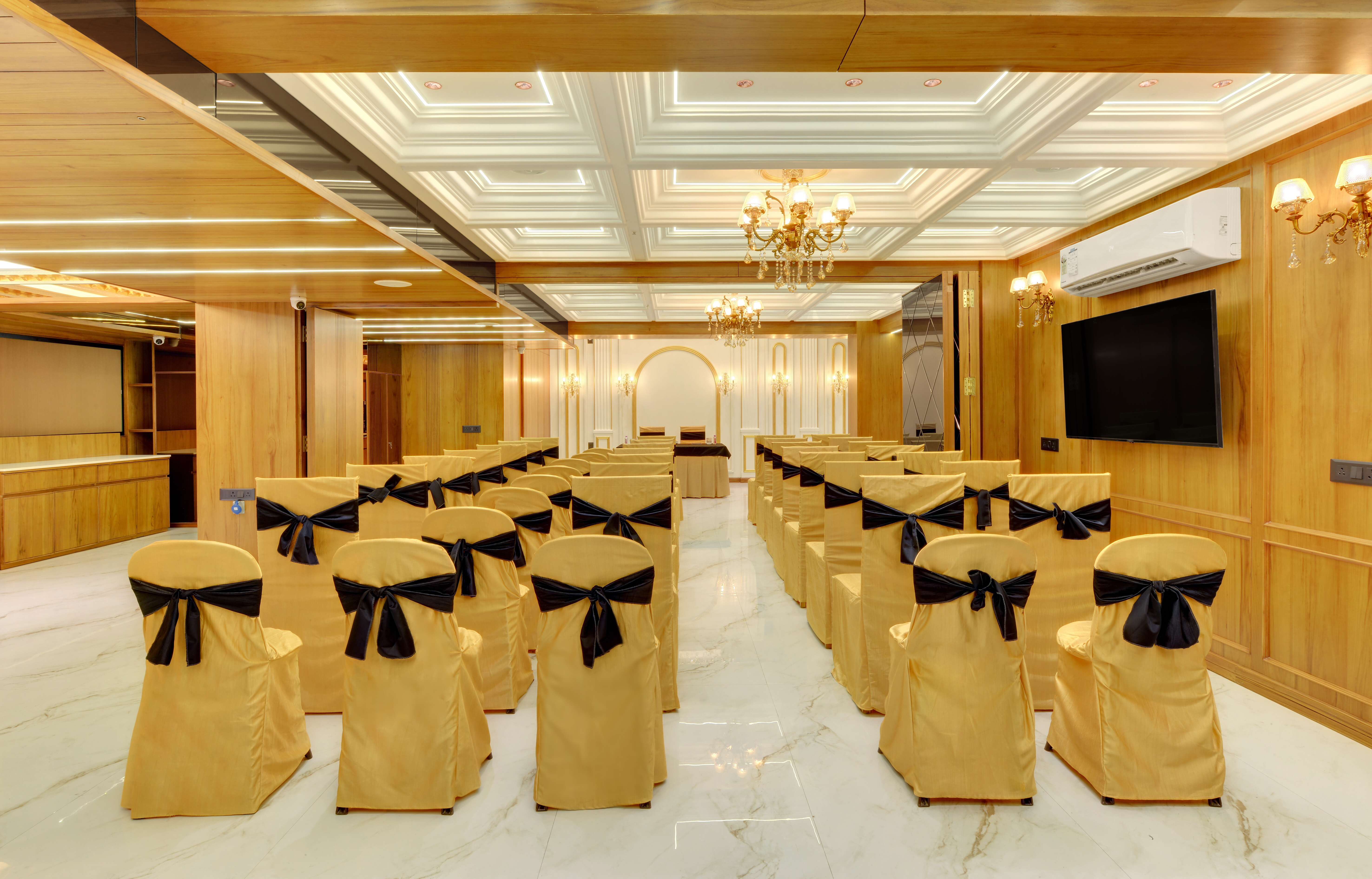 Hotel Shital Inn Conference Room with rows of guest seating